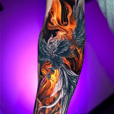 Yeins Gomez full color phoenix rising tattoo